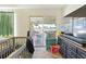 Bedroom featuring a sliding door exit to the back yard at 577 Waterfall Dr, Spring Hill, FL 34608