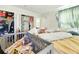 Bedroom with a closet and a crib at 577 Waterfall Dr, Spring Hill, FL 34608
