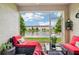 Relaxing screened patio with comfortable seating and tranquil water view at 601 52Nd Ter N, St Petersburg, FL 33703