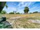 Large backyard featuring a new wooden privacy fence perfect for outdoor activities at 6403 N Lois Ave, Tampa, FL 33614