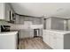 Beautiful kitchen with stainless steel appliances, island and white countertops at 6403 N Lois Ave, Tampa, FL 33614