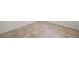 Close up of the neutral-colored tile flooring at 6433 Reef Cir, Tampa, FL 33625