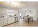 Well-maintained kitchen with stainless steel appliances and dining area at 6433 Reef Cir, Tampa, FL 33625