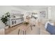 Bright living room with neutral decor, tile flooring, and natural light at 6433 Reef Cir, Tampa, FL 33625
