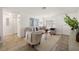 Bright living room with neutral decor, tile flooring, and natural light at 6433 Reef Cir, Tampa, FL 33625