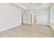 Bright main bedroom with plank floors, recessed lights and ensuite bathroom at 7304 Donnybrook Ln, Sarasota, FL 34240