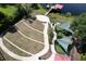 Overhead view of a charming park area with shaded playground and pathways, offering community enjoyment at 8016 Rock Spring Ct, Land O Lakes, FL 34638
