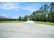 Charming single-Gathering home with a three-car garage, well-manicured lawn and a circular driveway in a quiet neighborhood at 8016 Rock Spring Ct, Land O Lakes, FL 34638
