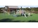 Community playground featuring modern play equipment and ample space for outdoor fun at 8641 Linked Dr, New Port Richey, FL 34655