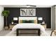 Modern bedroom with dark accent wall, stylish lamps, and a comfortable bed with decorative pillows at 8778 Linked Dr, New Port Richey, FL 34655