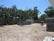 Spacious backyard featuring an above ground pool, storage shed, and grilling area at 8996 Southern Comfort Dr, Largo, FL 33773