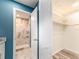Modern bathroom with glass enclosed shower, closet, and fresh paint at 9292 120Th Ln, Seminole, FL 33772