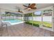 A beautiful, tiled patio with ceiling fans and a view of the pool at 9292 120Th Ln, Seminole, FL 33772