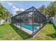 Beautiful pool with screened enclosure offering a peaceful retreat in a private backyard setting at 9292 120Th Ln, Seminole, FL 33772