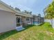 Enjoy the Florida outdoors with this screened-in pool and patio area, perfect for relaxing and entertaining at 9292 120Th Ln, Seminole, FL 33772