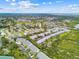 Aerial view of the community with beautiful mature landscaping and tree coverage throughout at 9812 Indian Key Trl # 84, Seminole, FL 33776