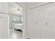 Bright bedroom with white closet doors and dresser, offering a serene and organized space at 9812 Indian Key Trl # 84, Seminole, FL 33776
