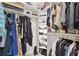 Spacious walk-in closet with organized storage for clothing and shoes at 9812 Indian Key Trl # 84, Seminole, FL 33776