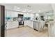 Bright kitchen features stainless steel appliances, granite countertops, modern cabinets, and an open layout at 9812 Indian Key Trl # 84, Seminole, FL 33776