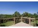 Relaxing deck view showcasing tropical greenery and beautiful landscape, great for entertaining at 9912 Chris Craft Ct, Tampa, FL 33615