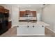Modern kitchen with stainless steel appliances, quartz countertops and wood cabinets at 10326 Boggy Moss Dr, Riverview, FL 33578
