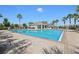 Inviting community pool with lane dividers, comfortable seating, and clear blue water for relaxation at 10326 Boggy Moss Dr, Riverview, FL 33578