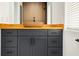 Stylish bathroom featuring a wood vessel sink, modern vanity, and elegant fixtures at 10406 N Boulevard, Tampa, FL 33612