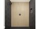 Modern shower featuring sleek black and gold tile design and contrasting fixtures, providing a luxurious bathing experience at 10406 N Boulevard, Tampa, FL 33612