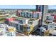 Aerial view pointing to building with rooftop amenities, highlighting location and overall property appeal at 1120 E Kennedy Blvd # 1127, Tampa, FL 33602
