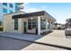 Exterior shot of amenity center with covered walkway and ample natural light, enhancing property value at 1120 E Kennedy Blvd # 1127, Tampa, FL 33602