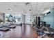 Community gym with treadmills, weight machines, and large windows providing natural light and neighborhood views at 1120 E Kennedy Blvd # 1127, Tampa, FL 33602