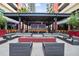 Inviting outdoor lounge with comfortable seating, a fire pit, and a vibrant atmosphere for socializing and relaxing at 1120 E Kennedy Blvd # 1127, Tampa, FL 33602