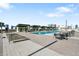 Features a pool deck with lounge chairs and seating, ideal for relaxation against a cityscape backdrop at 1120 E Kennedy Blvd # 1127, Tampa, FL 33602