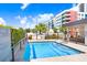 Inviting outdoor spa pool, surrounded by lush greenery and city views at 1120 E Kennedy Blvd # 1127, Tampa, FL 33602