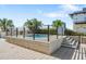 Elevated rooftop pool area surrounded by lush greenery and comfortable seating, perfect for leisure at 1120 E Kennedy Blvd # 1127, Tampa, FL 33602