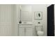 Modern bathroom with a sleek vanity, toilet, and contemporary decor at 11746 Brae Way, Dade City, FL 33525