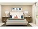 Comfortable bedroom with a large bed, matching nightstands, and natural light at 11746 Brae Way, Dade City, FL 33525