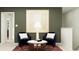 Inviting living room featuring comfortable seating, modern art, and neutral decor at 11746 Brae Way, Dade City, FL 33525