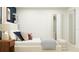 This main bedroom has decor on the wall, layered pillows on the bed, and an open closet at 11746 Brae Way, Dade City, FL 33525