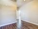 Bright bedroom featuring sleek wood floors and neutral walls at 13110 Manistee Rd, Weeki Wachee, FL 34614
