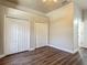 This bedroom boasts wood floors and large closet space at 13110 Manistee Rd, Weeki Wachee, FL 34614
