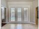 Bright entryway with a view of the backyard pool through glass paneled doors at 13110 Manistee Rd, Weeki Wachee, FL 34614