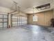 Spacious two car garage features ample space for storage and projects, with water heater at 13110 Manistee Rd, Weeki Wachee, FL 34614