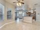 Well-lit kitchen with granite countertops and modern appliances, overlooking the living area at 13110 Manistee Rd, Weeki Wachee, FL 34614
