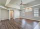 Spacious living room featuring hard wood floors and plenty of natural light at 13110 Manistee Rd, Weeki Wachee, FL 34614