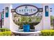 Elegant community sign reading Lakeview at Citrus Park with lovely water feature at 14245 Damselfly Dr, Tampa, FL 33625