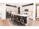 Gourmet kitchen boasts stainless steel appliances and a stylish island at 14245 Damselfly Dr, Tampa, FL 33625