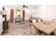 Comfortable living area with stylish rug, furniture and access to the backyard at 14245 Damselfly Dr, Tampa, FL 33625