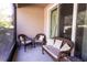 Cozy screened patio with comfortable seating and a relaxing atmosphere at 14245 Damselfly Dr, Tampa, FL 33625