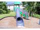 The community playground is equipped with modern slides and a climbing structure in a secure area at 14245 Damselfly Dr, Tampa, FL 33625